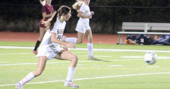 Luke Caputo/Kitsap News Group photos
Spartan Taylor Mass goes after the ball with fellow Spartan Abril Edwards and Buccaneer Paiton Leibold looking on in a 6-0 Baibridge road win over Kingston Oct. 21.