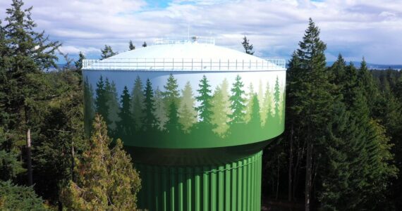 COBI courtesy photo
The new Winslow Water Tank, featuring art of evergreen trees.
