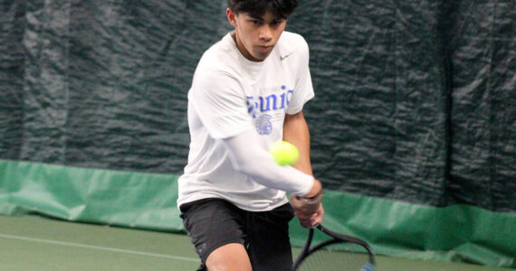 Luke Caputo/Kitsap News Group photos
Olympic Trojan Jonah Pantig won the 2A WCD singles championship in a 6-1, 6-3 victory over Bremerton Knight Joseph Cao Oct. 31 at the Kitsap Tennis & Athletic Center.