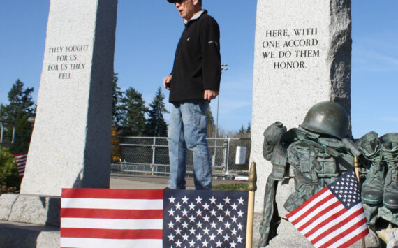 Molly Hetherwick/Kitsap News Group photos
Gary Sakuma, a U.S. Air Force veteran and commander of the BI’s American Legion Post, describes the significance of the World War II Memorial at Bainbridge High School.