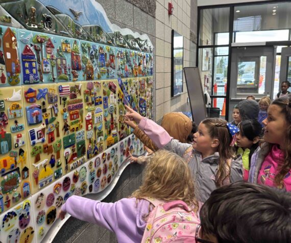 <p>Diane Bonciolini courtesy photos</p>
                                <p>Students at Summitview Elementary in Yakima take a look at their finished work in the mural they created with Mesolini Glass Studios.</p>