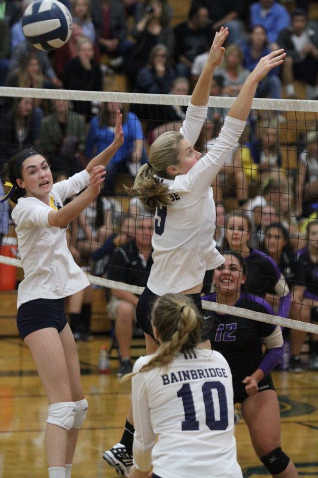 The Spartans try to hold off the Vikings during the second set of the North Kitsap-Bainbridge matchup in varsity volleyball.