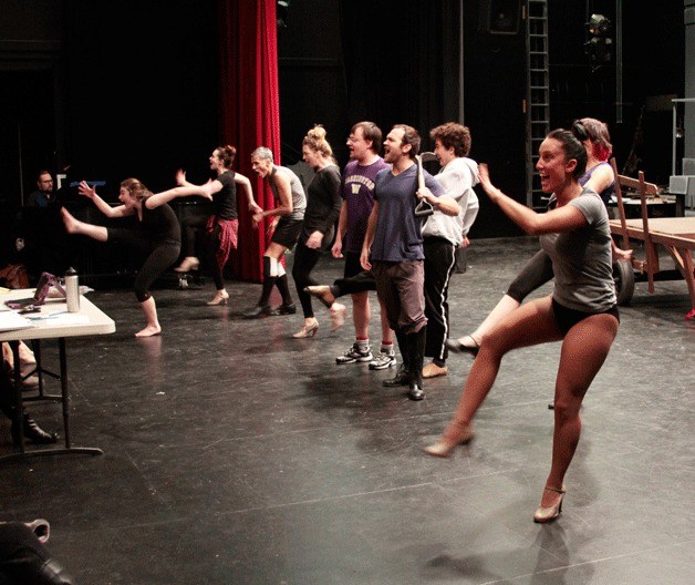 The cast of Monty Python's 'Spamalot' run through one of the comedy's musical numbers at a rehearsal at Bainbridge Performing Arts.
