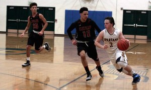 Trent Schulte drives the ball through the defensive efforts of the Cleveland Eagles in Tuesday's postseason matchup.