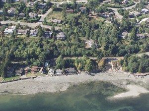 The crumbling Rockaway Beach Road sits on a eroded hill on the southeast portion of the island.