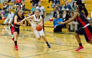Spartan senior guard Maddie Ketcheside drives to the hoop during the home game against Cleveland High.