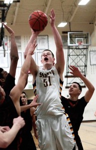 BHS junior wing/post Oskar Dieterich brings the action to the basket during the home game against Cleveland High Tuesday