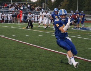 Senior Alex Coplan catches the ball for a first down shortly before the Spartans scored their first touchdown of the game.