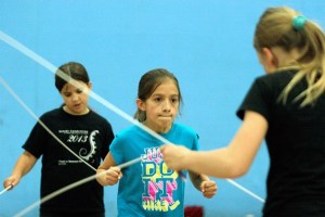 Sophia DeBellis is the picture of concentration as she practices in a Double Dutch speed event Monday in the Commodore gym.