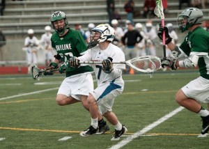 BHS senior and Spartan goalie Reynolds Yarbrough looks to pass the ball after leaving the net and rushing it past midfield late in the fourth quarter of Tuesday’s home game against Skyline High.