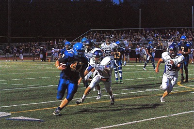 Bainbridge fullback Alex Johnson (47) scored three first-half touchdowns in the Spartans' 35-19 win over North Kitsap