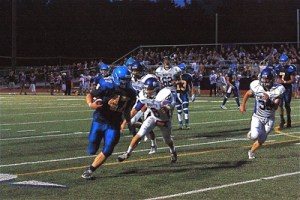 Bainbridge fullback Alex Johnson (47) scored three first-half touchdowns in the Spartans' 35-19 win over North Kitsap