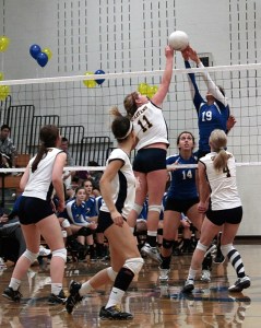 Lauren Sheehan tries to force a return against Seattle Prep during the Spartans’ final home game last week.
