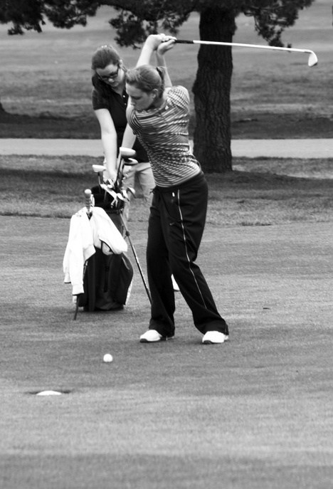 Anna Bourland keeps her eye on the ball at practice.