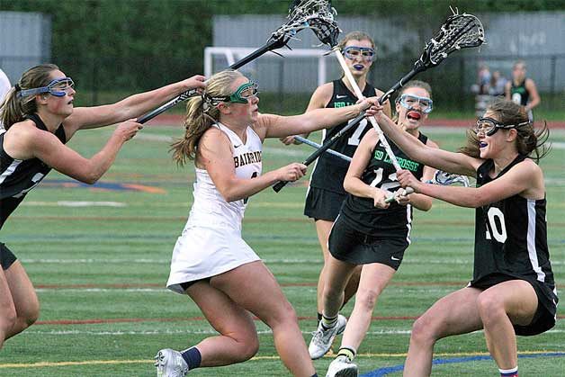 Paige Brigham scores one of her three goals against Issaquah.
