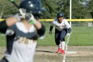 The Spartans’ Malia Peato gets set to sprint toward home plate in Bainbridge’s big win over Chief Sealth.