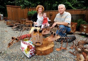 Shannin Strom-Henry and Dick Strom with Zoe. See Shannin