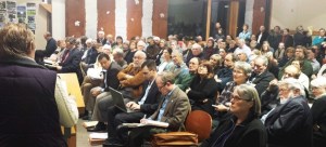 Public testimony gets underway before a packed house at Bainbridge Island City Hall on Thursday as the city's hearing examiner begins his review of the controversial Visconsi shopping center proposal.