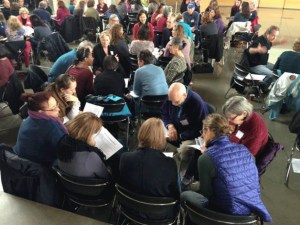 Participants at the first Bainbridge Healthy Youth Summit talk during a break-out session at the November event.