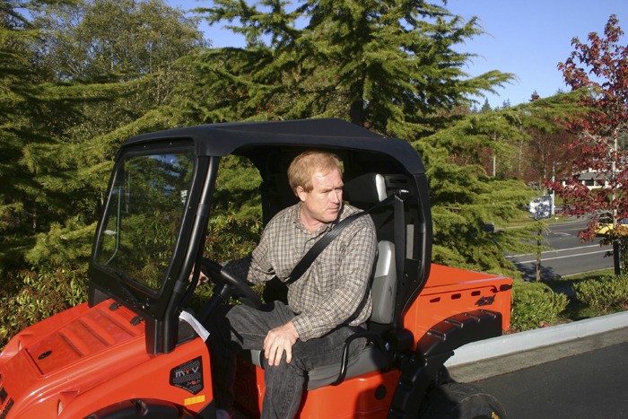 Sales manager Jeff Bahkus (above) believes Bainbridge buyers of Go Green’s electric cars will be early risk takers willing to trying something new