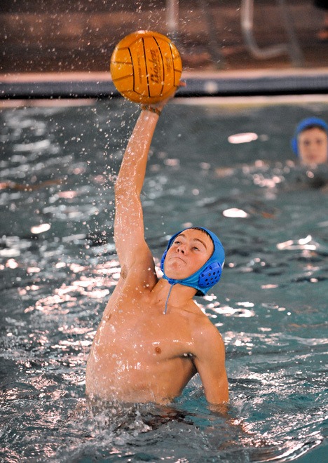 Ian Layton snatches the ball during water polo practice this week.
