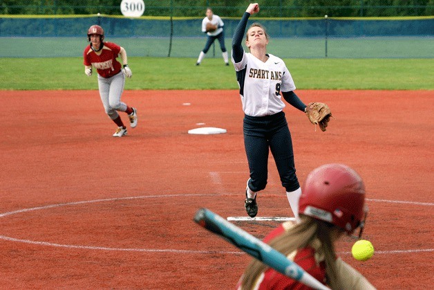 Bainbridge Spartan pitcher Katie Raben fires one toward the plate during Bainbridge’s first-round game against the University Titans.