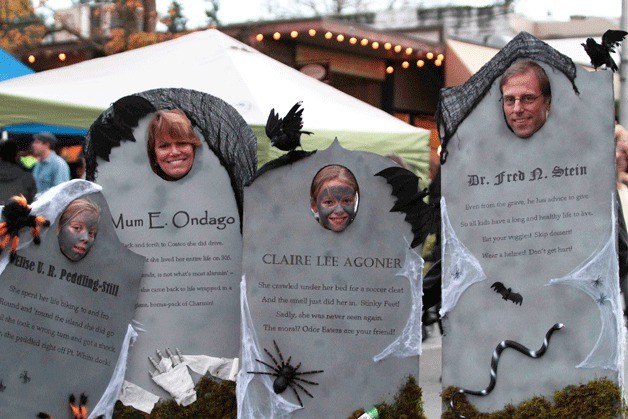 One family came to the downtown Winslow Trick Or Treat night event Friday appropriately clad as tombstones