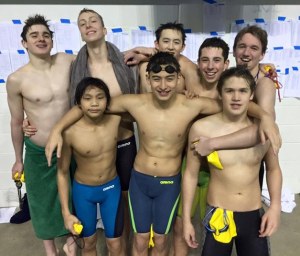 Members of the Bainbridge Island Swim Club gather for a photo after the team won third place at the Pacific Northwest Swimming Championships.