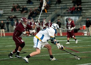 Jack Frickleton rushes to regain ball control during the Spartan home game against Mercer Island.