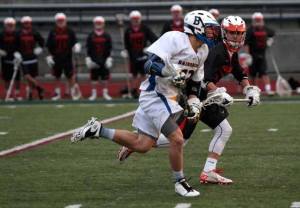 BHS senior Ben LaRoche runs through the defenses of Eastside Catholic during Tuesday’s home match. LaRoche scored one goal