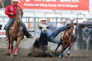 Casey Martin wrestles a steer in recent rodeo action.