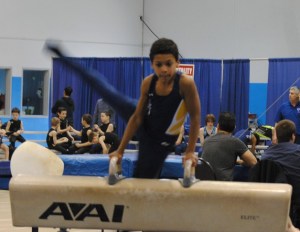 Jayden Wood-Johnson competes on the pommel horse during the Rose City Challenge.
