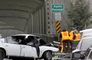 The Washington State Patrol investigates a three-car crash at the Agate Pass Bridge Monday.