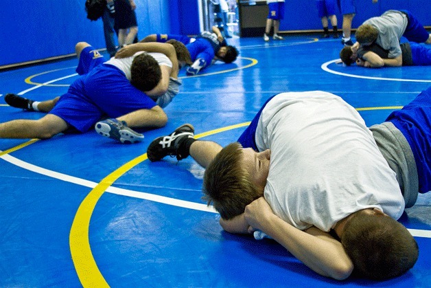 Bainbridge High wrestler Greg Williams is pinned by teammate Joaquin Gurza during a recent practice session. “Sometimes you just have to suffer more than the other guy