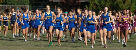 The Bainbridge girls team takes off the line during a recent home meet at Battle Point Park.