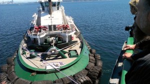 The ferry Lindsey Foss tows the ferry MV Tacoma out into Puget Sound after the vessel lost propulsion power on its way to Bainbridge Island Tuesday.