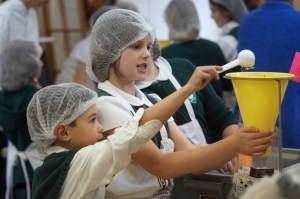 Students at Carden Country School help package meals destined for children in the West African nation of Sierra Leone.