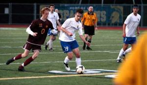 Anton Easterbrook drives the ball through O'Dea's defensive efforts during last Thursday's game.