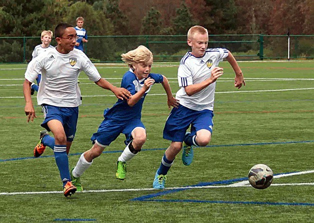 Luciano Marano | Bainbridge Island Review Teams from around the Pacific Northwest made the trip from near and far to the soccer fields of Bainbridge Island for the 2013 Island Cup.