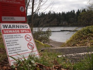 Warning signs sit at the entrances to the park at Blakely Harbor.