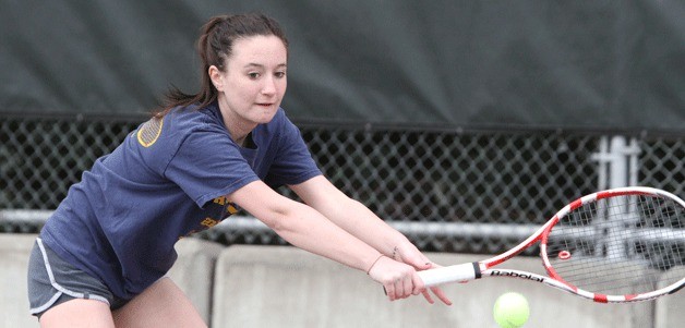 Jordan Ferguson volleys her way to a win in No. 1 girls singles against Mary Pat Lee of Seattle Prep.