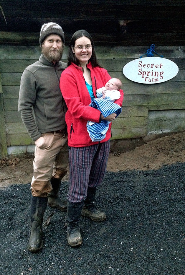 Kavi Cedar Ostrom with parents Erik and Maia.