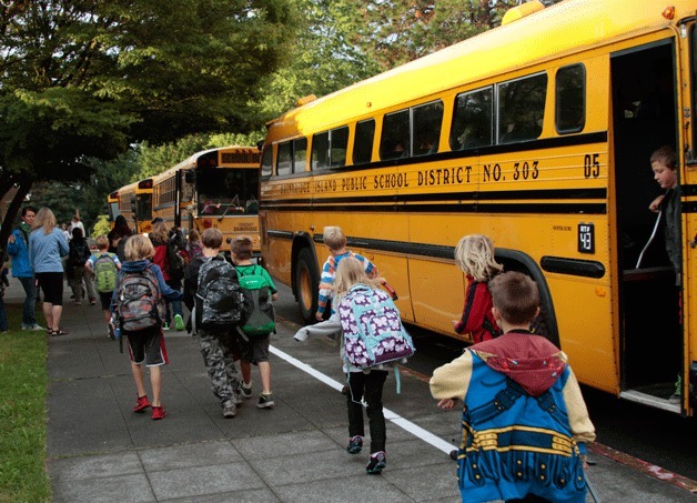 Students arrive for the first day of school at Captain Johnston Blakely Elementary on Wednesday.