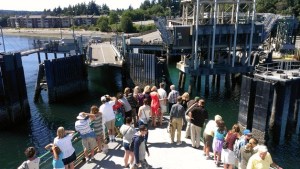 The ferry MV Tacoma slowly made its way into Eagle Harbor by 3 p.m. Tuesday with the help of two tugboats. The ferry lost propulsion power around 1 p.m.