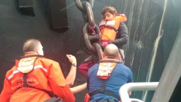 Crew members from Coast Guard Station Bellingham assist Chiara D’Angelo