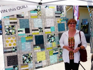 Quilt Festival raffle winner Jane Cummings of Lenore