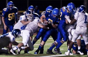 Bainbridge fullback Jake Brigham (7) scores one of his two touchdowns against Seattle Prep Friday night.