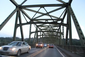 Vehicles pass over the Agate Pass Bridge earlier this month. The state has announced plans to shut down the bridge to one lane for three weeks in February for bridge cleaning and maintenance.