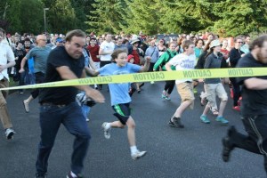 Thrifty shoppers race onto the scene as the Rotary Auction and Rummage Sale opens.