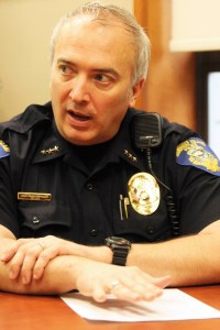 Bainbridge Police Chief Matthew Hamner talks about a spree of recent car prowls during an informal press conference Friday.